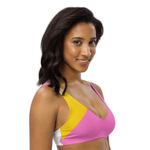 Recycled bikini sports bralette with removable pads in a playful pink, yellow and white color palette.