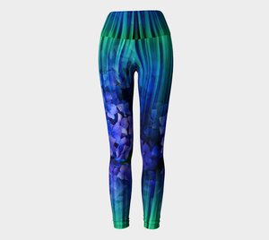 High waisted compression leggings with blue and green imagery and subtle blue florals