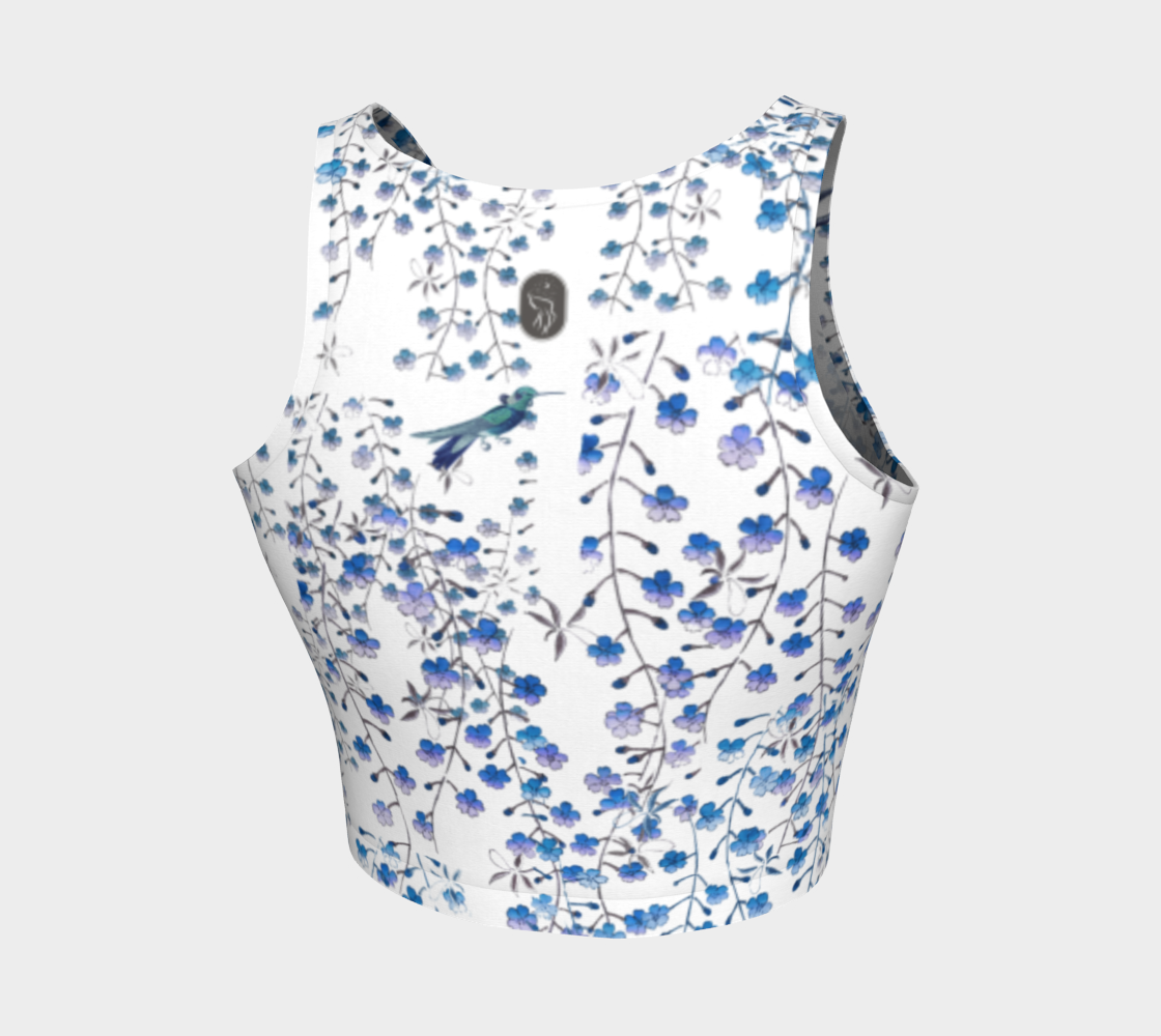 Tiny blue florals and hummingbirds dance across this full coverage athletic top.