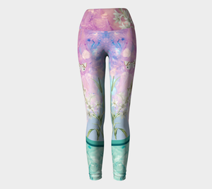 A unique blend of crystal imagery and butterfly florals adorns these compression leggings