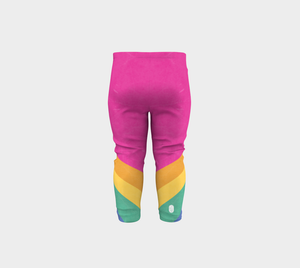 Rainbow color blocking against a bright pink backdrop on these baby leggings