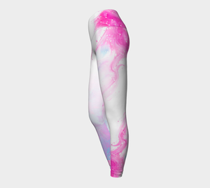 Ethereal pink and blue print against a white background on these compression leggings