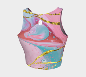 Ethereal prints mixed with pinks and pops of gold adorn this athletic top