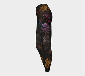 Moody dark florals adorn these high-waisted compression  leggings