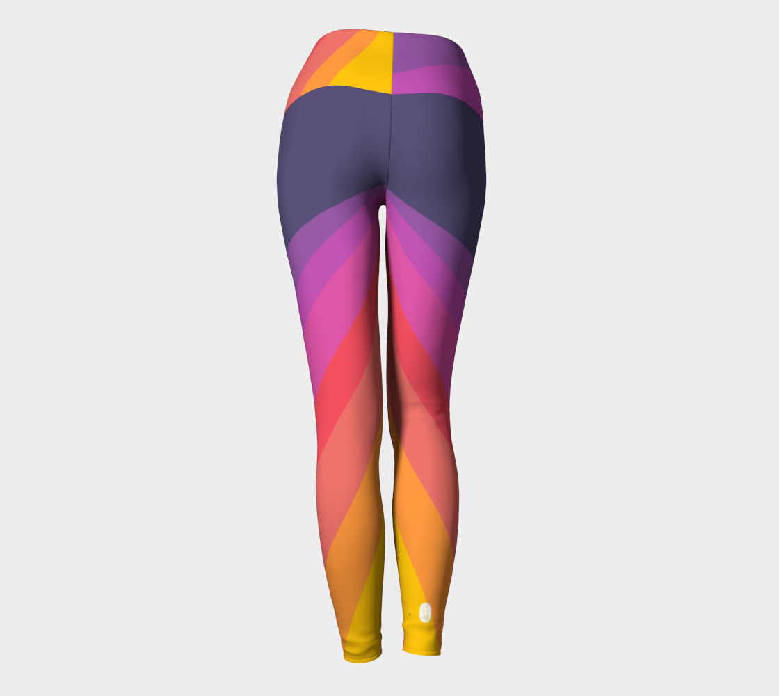 A gorgeous vibrant sunset color palette adorn these high-waisted compression leggings