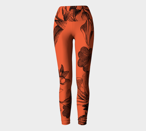 Black botanicals set against a red background on these compression high-waisted legggings.