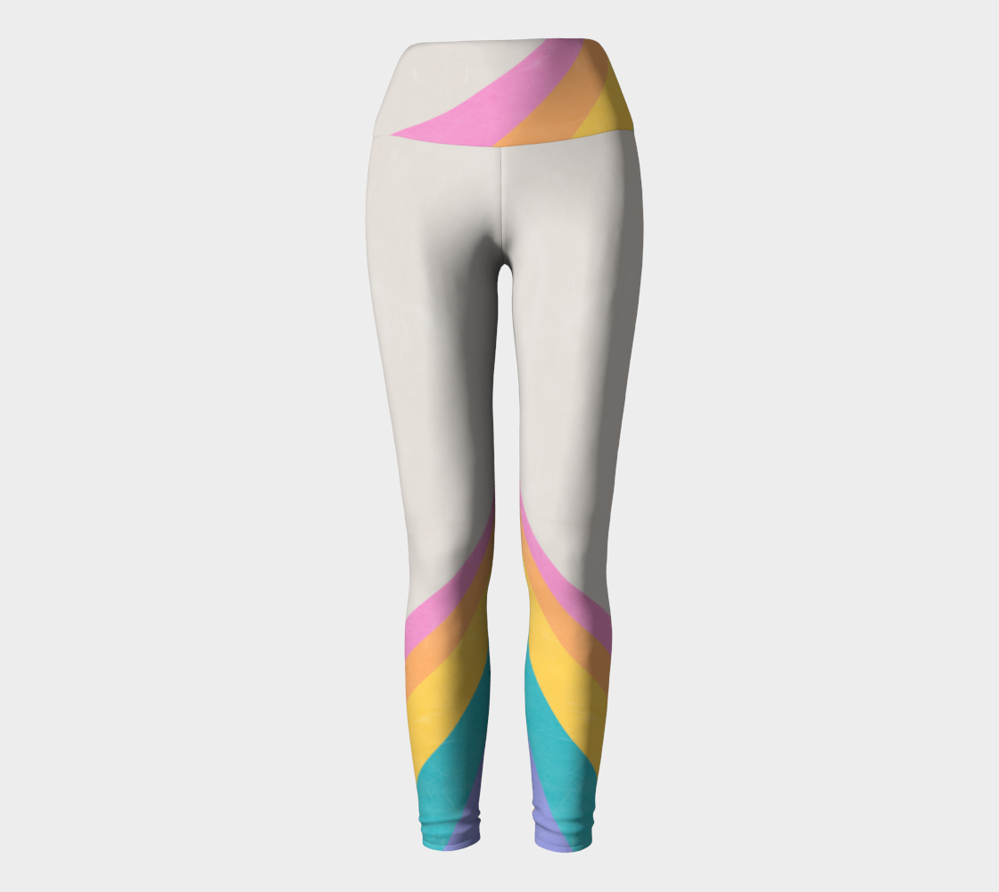 A color block style featuring a colorful rainbow adorn these compression leggings