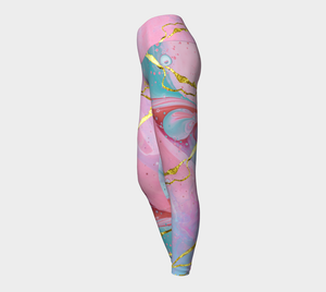 Ethereal prints mixed with pinks and pops of gold adorn these compression leggings.