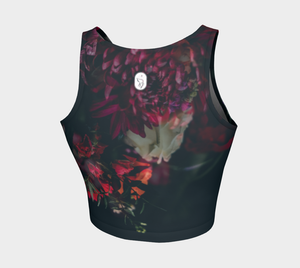 Dark moody florals sit against a midnight sky on this athletic top