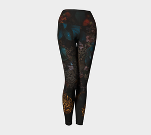 Moody dark florals adorn these high-waisted compression  leggings