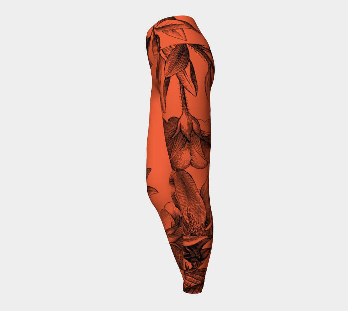 Black botanicals set against a red background on these compression high-waisted legggings.