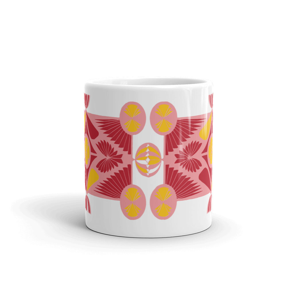 11 oz ceramic mug in pink, red and yellow art deco prints.